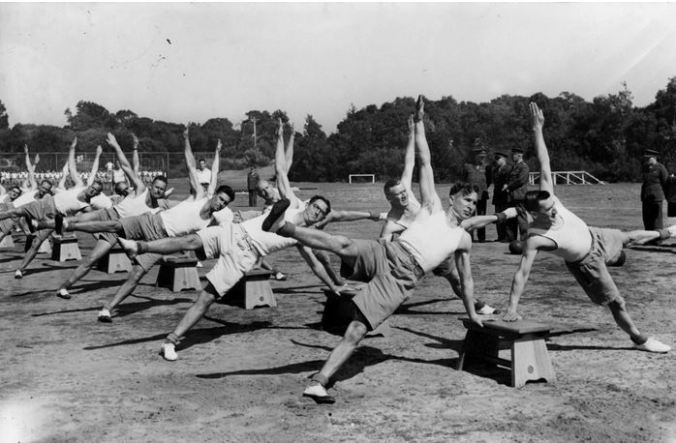 Physical training at P. T. & R. School (ca 1942) Image Courtesy of the State Library of Victoria,Argus newspaper collection of war photographs. World War II. Image No. H98.105/4467 http://handle.slv.vic.gov.au/10381/197430